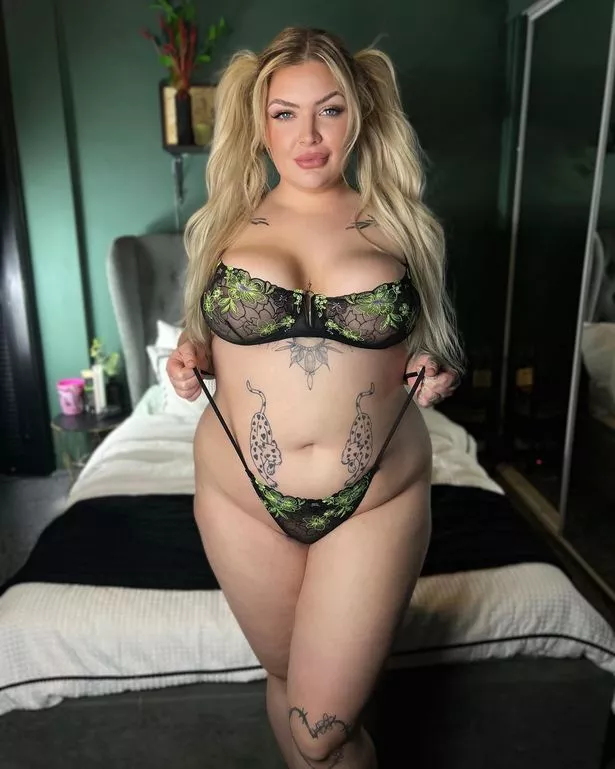 Model Kayla Keen poses in a green-and-black lingerie set